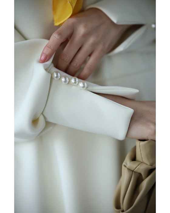 日常に馴染むエレガント。パールポワン袖プルオーバートップス