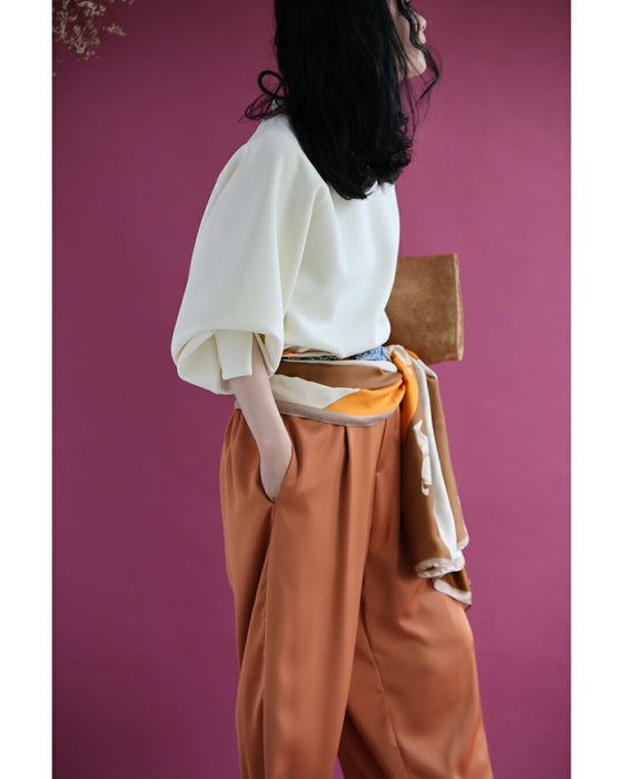 日常に馴染むエレガント。パールポワン袖プルオーバートップス