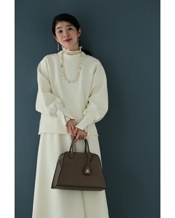 日常に馴染むエレガント。パールポワン袖プルオーバートップス