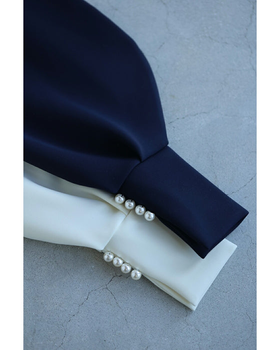 日常に馴染むエレガント。パールポワン袖プルオーバートップス