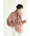 (With ribbon) A glossy blouse top that adds a touch of elegance