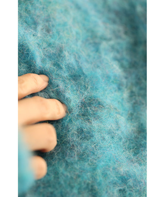 綿菓子のようにふわふわ。ショート丈ファープルオーバートップス