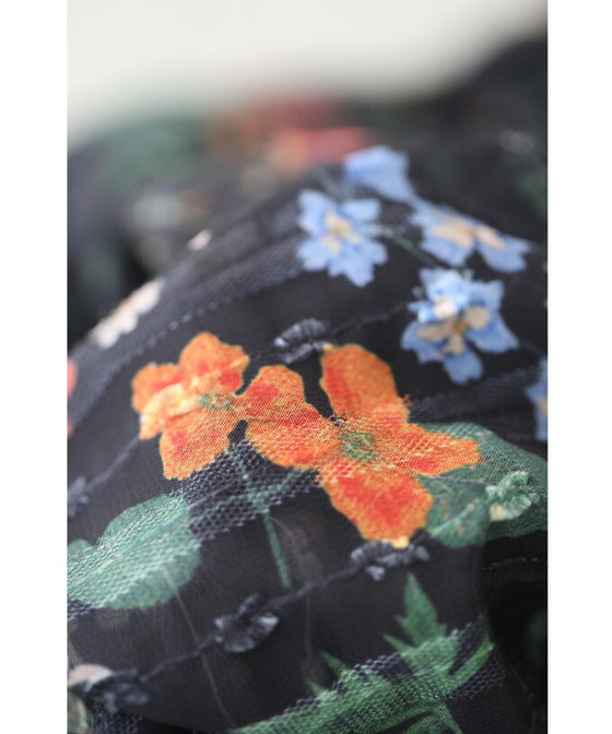 (ストラップ付き)ワンピースにもなる2way仕様。鮮やかな花柄ミディアムスカート