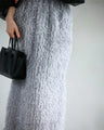 A sparkly and fluffy fringe skirt that will lift your spirits