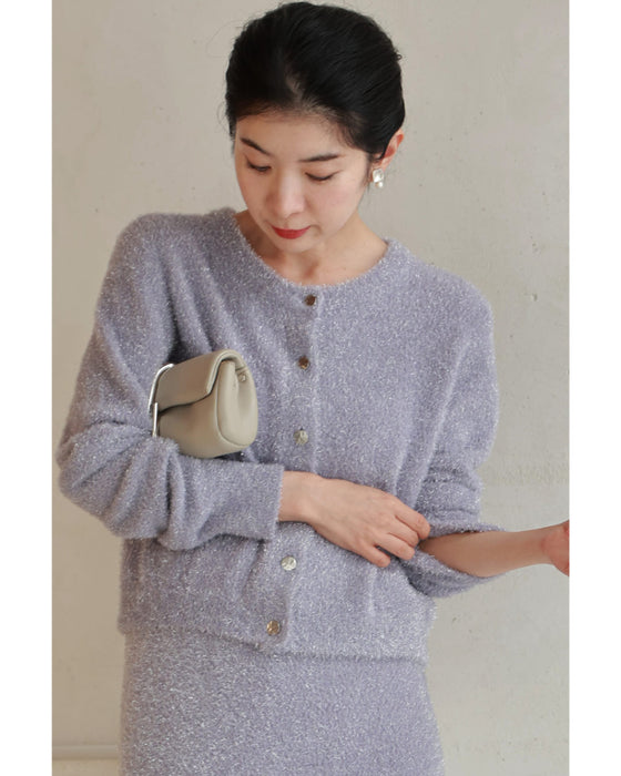 A stretchy knit cardigan with a sparkly brushed finish