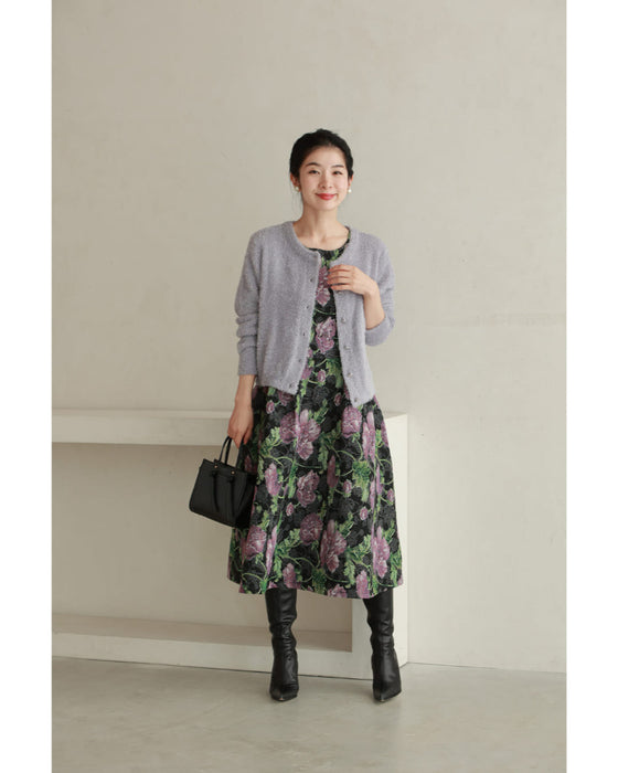A stretchy knit cardigan with a sparkly brushed finish