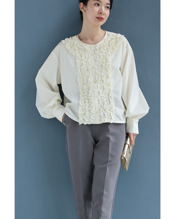 流れるホイップクリームフリルのブラウストップス