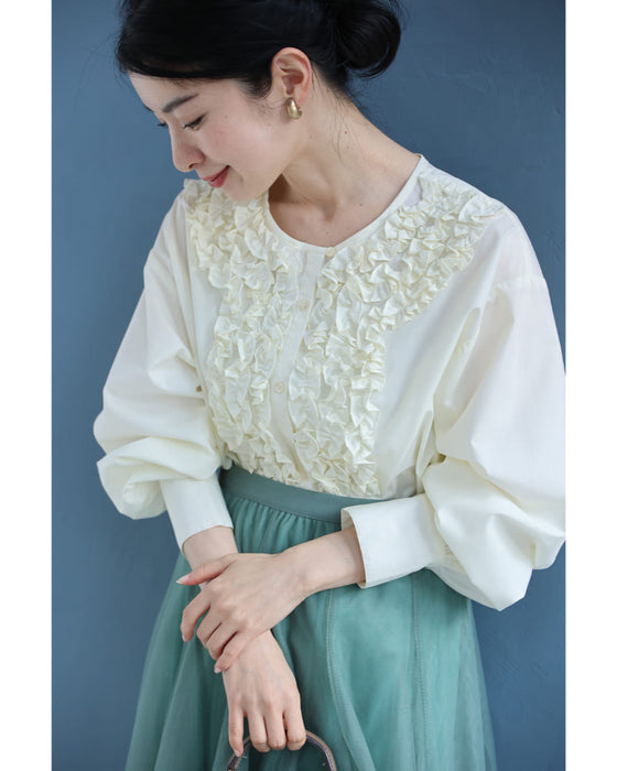 流れるホイップクリームフリルのブラウストップス