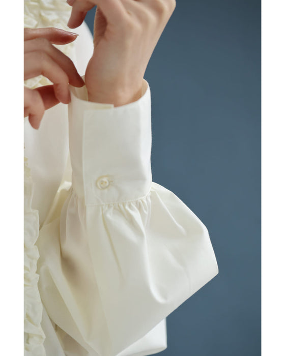 流れるホイップクリームフリルのブラウストップス