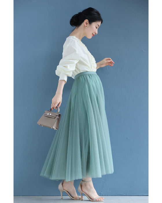 流れるホイップクリームフリルのブラウストップス