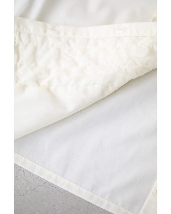 流れるホイップクリームフリルのブラウストップス