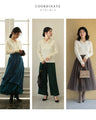 A fluffy knit top with finely sparkling sequins and fluffy collar and sleeves
