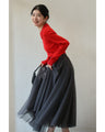 A fluffy knit top with finely sparkling sequins and fluffy collar and sleeves