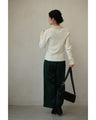 A fluffy knit top with finely sparkling sequins and fluffy collar and sleeves