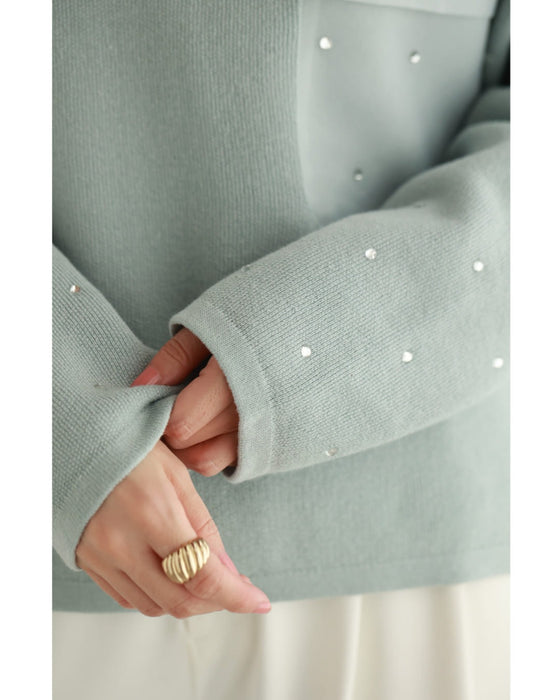 袖に輝くビジューとシアーポケットのニットプルオーバートップス