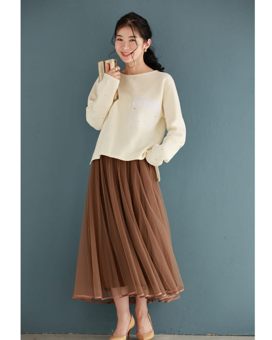 袖に輝くビジューとシアーポケットのニットプルオーバートップス