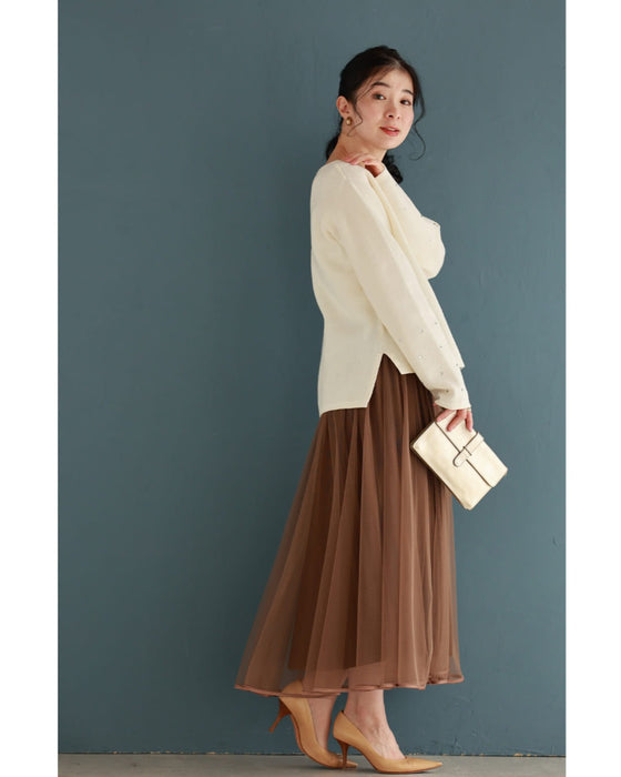 袖に輝くビジューとシアーポケットのニットプルオーバートップス