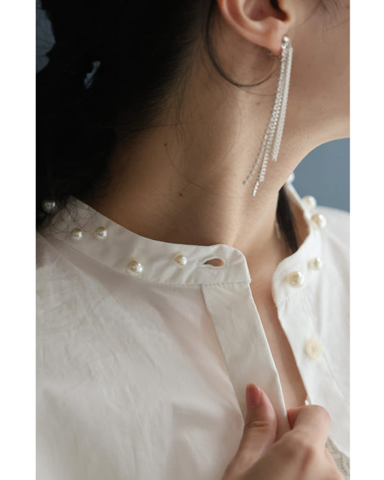 首周り囲むパールネックシャツトップス