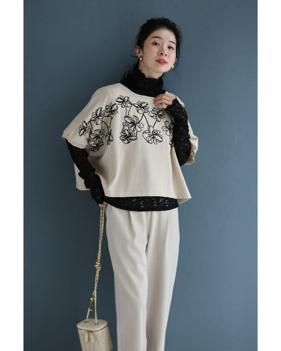 繋がり合う花刺繍のドルマンニットカットソートップス