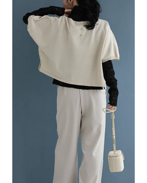 繋がり合う花刺繍のドルマンニットカットソートップス