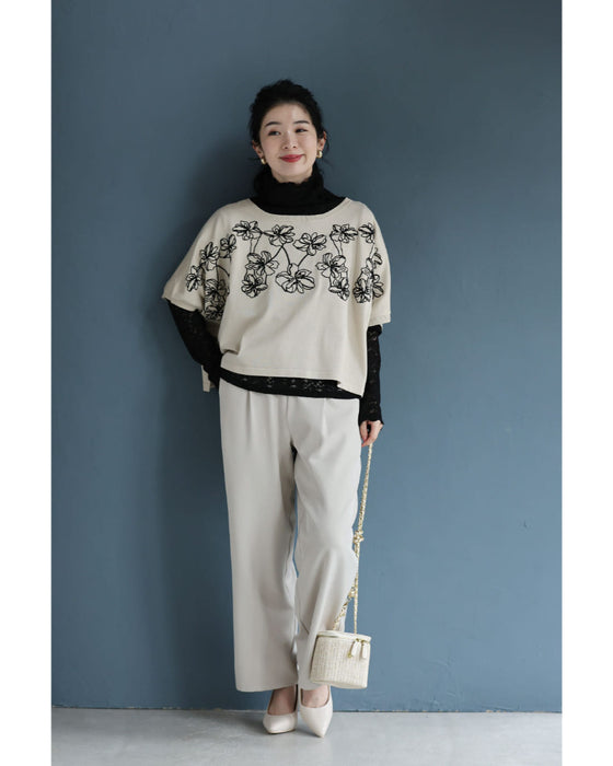 繋がり合う花刺繍のドルマンニットカットソートップス