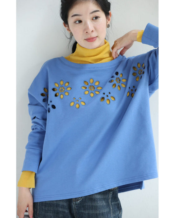 連なるパンチングフラワーのプルオーバートップス