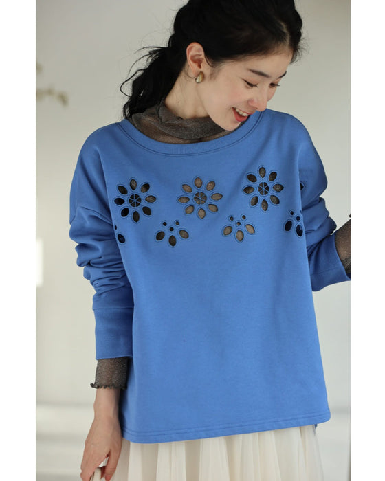 連なるパンチングフラワーのプルオーバートップス