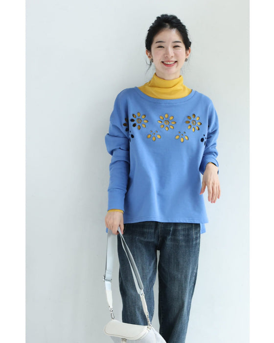 連なるパンチングフラワーのプルオーバートップス