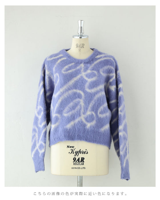 揺らめくリボン柄の起毛ニットプルオーバートップス