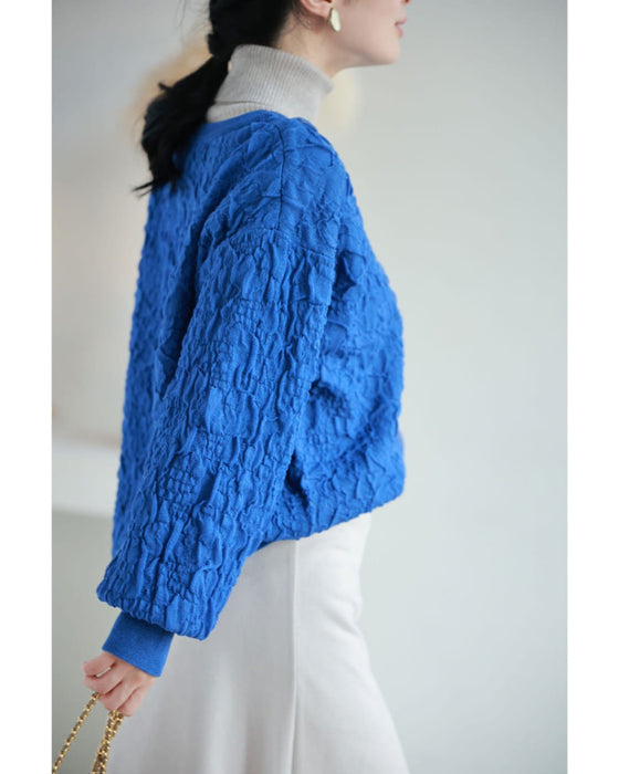 鮮やかな青の水面プルオーバートップス