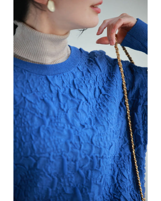 鮮やかな青の水面プルオーバートップス