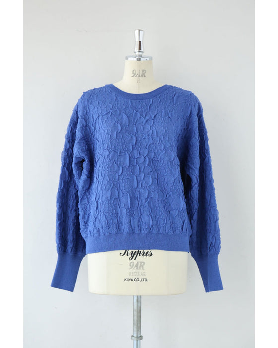 鮮やかな青の水面プルオーバートップス