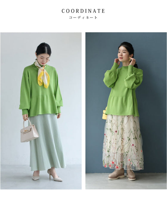 なだらかなペプラムラインのニットプルオーバートップス