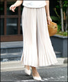 Shiny pleated pants to elevate your outfit