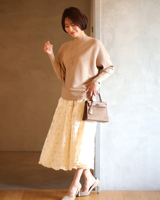 A big hit with customers! A loose dolman knit that you can really wear