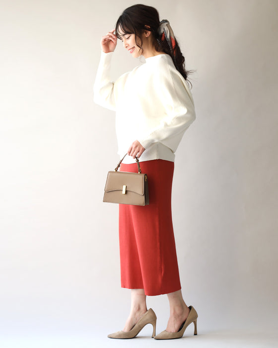 A big hit with customers! A loose dolman knit that you can really wear