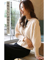 A lovely compact puff sleeve cardigan