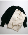 A lovely compact puff sleeve cardigan