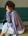 Stand out from the crowd! A light-colored flared blouse with a modern silhouette
