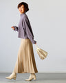Stand out from the crowd! A light-colored flared blouse with a modern silhouette
