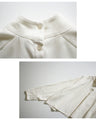 Stand out from the crowd! A light-colored flared blouse with a modern silhouette