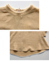 Goes great with skirts! A short, flared top that makes your legs look longer just by wearing it.