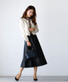 Surprisingly easy! Switch from summer to autumn with an eco-leather skirt