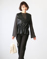 A sheer layered top that looks great with just one item!