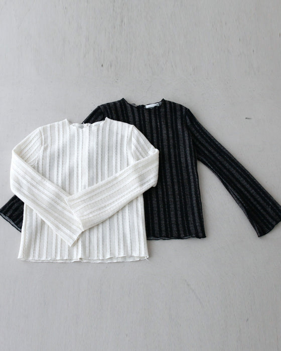 A sheer layered top that looks great with just one item!