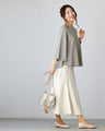 For winter to spring coordination: A knit cut-off sleeve top for adults that can be worn across the seasons
