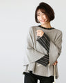 For winter to spring coordination: A knit cut-off sleeve top for adults that can be worn across the seasons