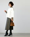 For winter to spring coordination: A knit cut-off sleeve top for adults that can be worn across the seasons