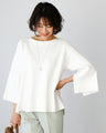 For winter to spring coordination: A knit cut-off sleeve top for adults that can be worn across the seasons