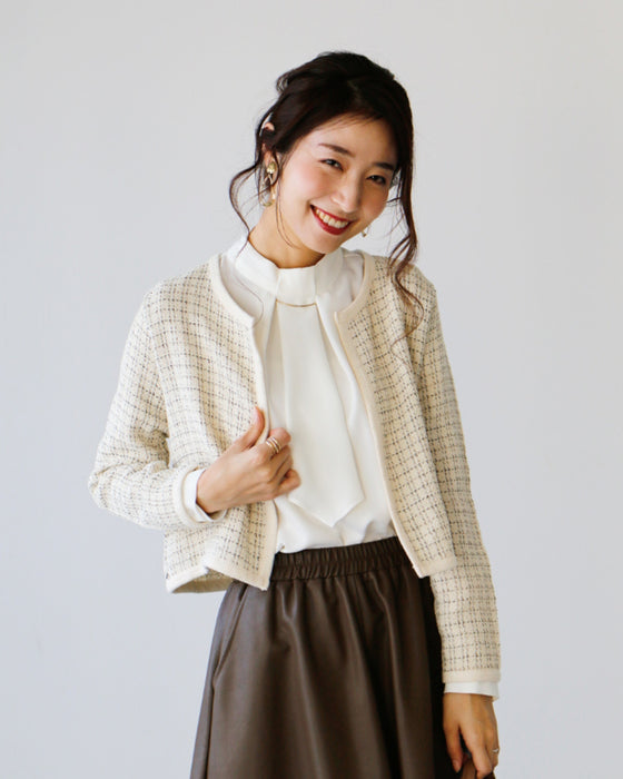 No need to tie it. Just put it on and you're done! Bowtie blouse